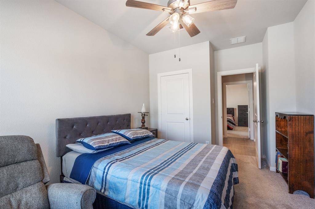 Following the flow of the home, from the front entryway this is secondary bedroom #1.