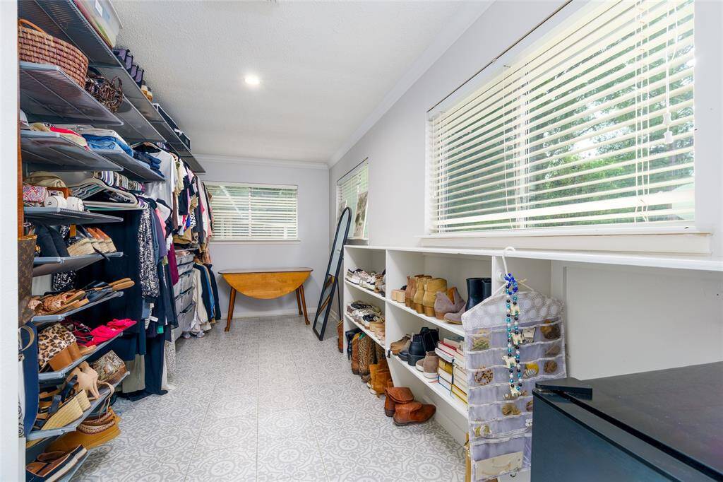 Second closet in primary bathroom.