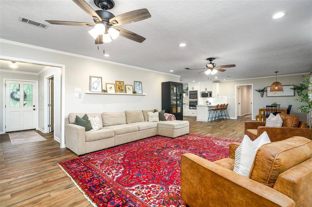 Open floor plan with recessed can lighting.