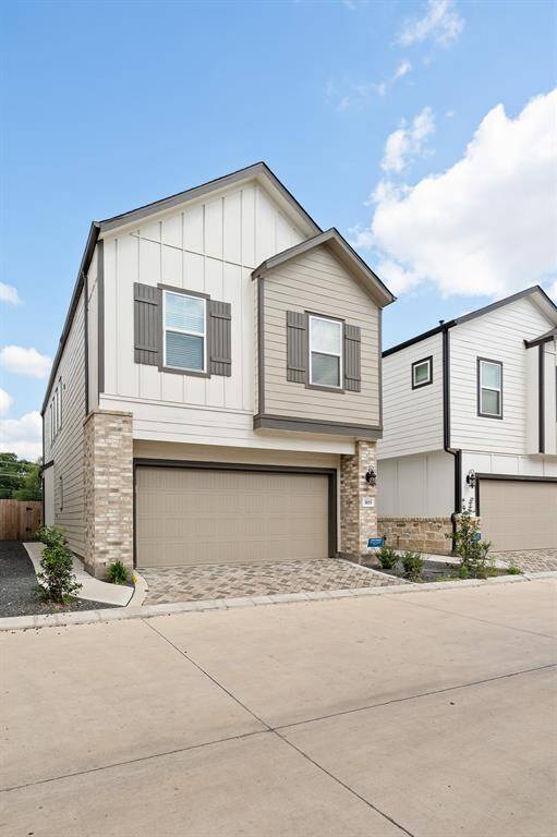 Discover this modern two-story home featuring a stylish brick and siding exterior, a spacious double garage, and a pristine driveway. Elegant window shutters and a charming front landscape enhance its welcoming appeal.