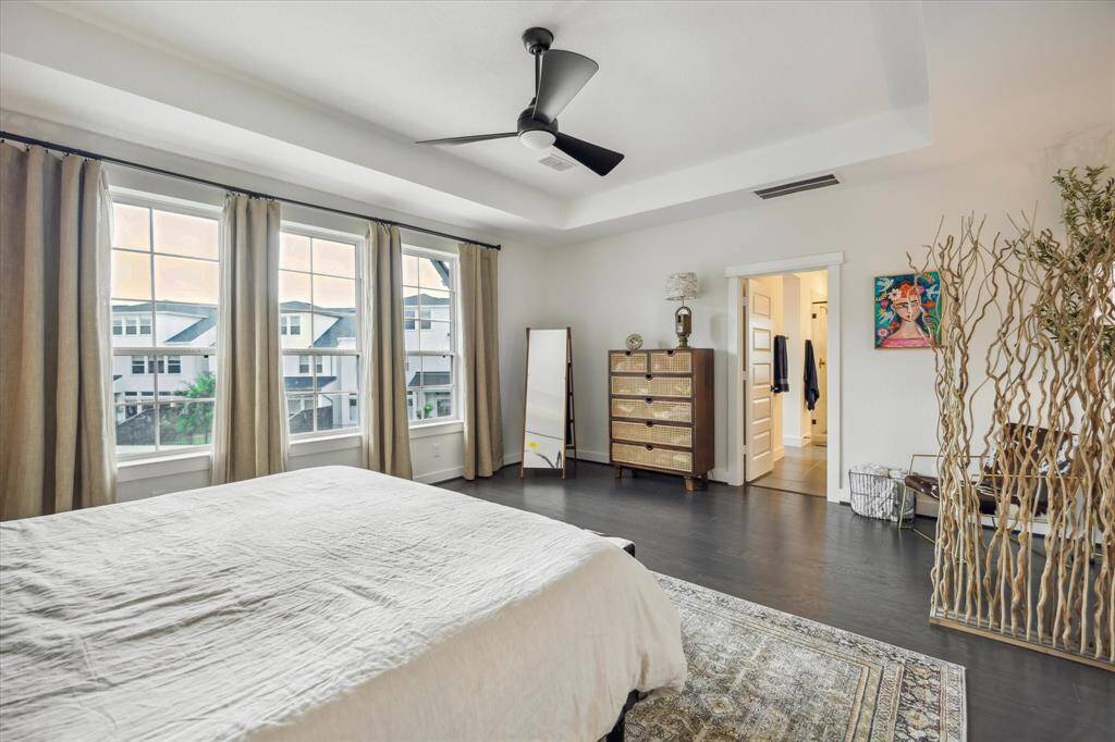 Retreat to the spacious and serene primary suite, thoughtfully designed for both comfort and privacy.