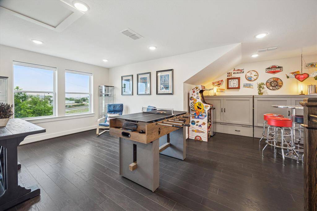 The ultimate entertainment hub, this game room is designed for fun, relaxation, and making memories. With plenty of space for a pool table, arcade games, or a gaming console setup, it's perfect for hosting game nights or enjoying some solo downtime.