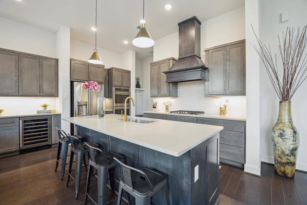 At the heart of the home, the kitchen seamlessly blends style and functionality.