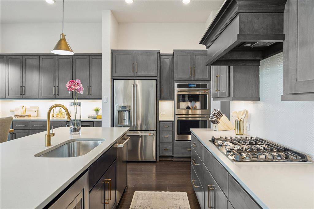 Featuring sleek countertops, ample cabinetry, and top-of-the-line appliances, it’s built to handle everything from quick weekday meals to gourmet dinner parties.