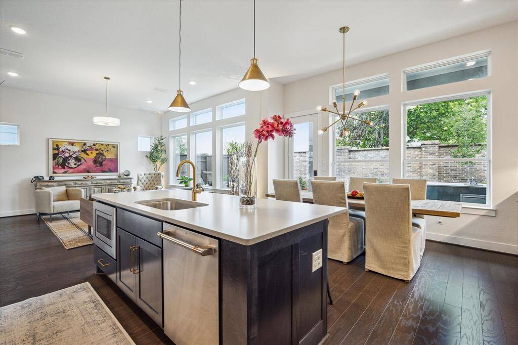 Windows galore! Cook with views of your spectacular backyard. This open concept living means seamless entertainment indoors and outdoors.