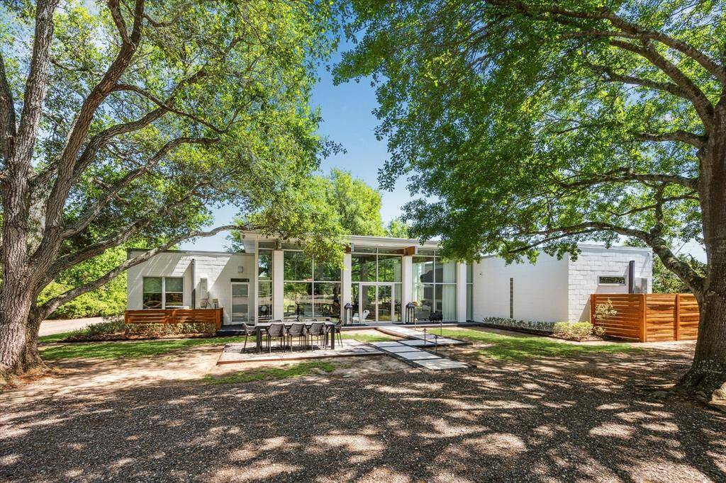 Are we really in Bellville? This gem is truly unique with its contemporary design of glass, cinder blocks, and wood, you'd be the coolest kid in the city as the owner!
