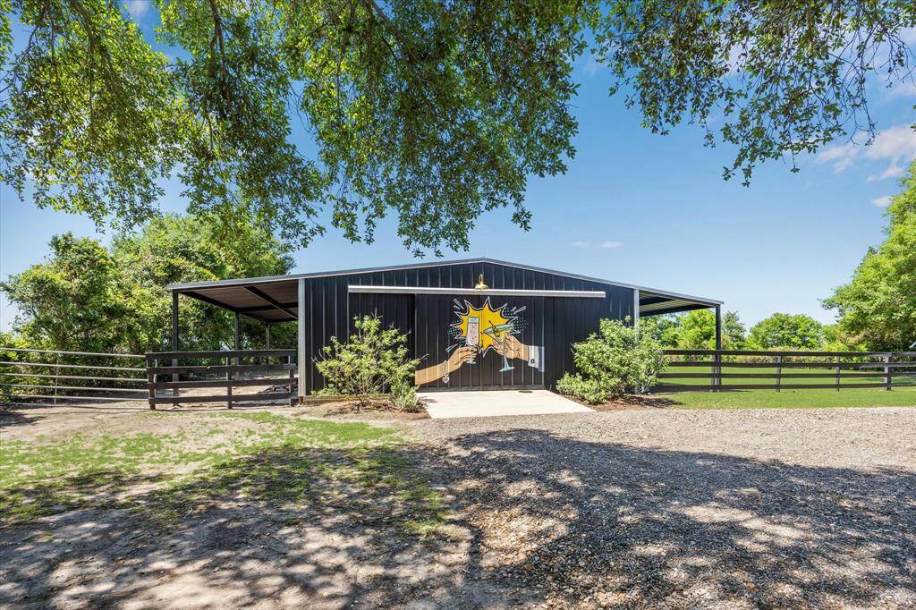 Let's not forget this incredible barn with 3 stalls. Two thirds of the interior surface is concrete slab; another great space with endless possibilities...horses, party barn, storage, whatever suits your needs.