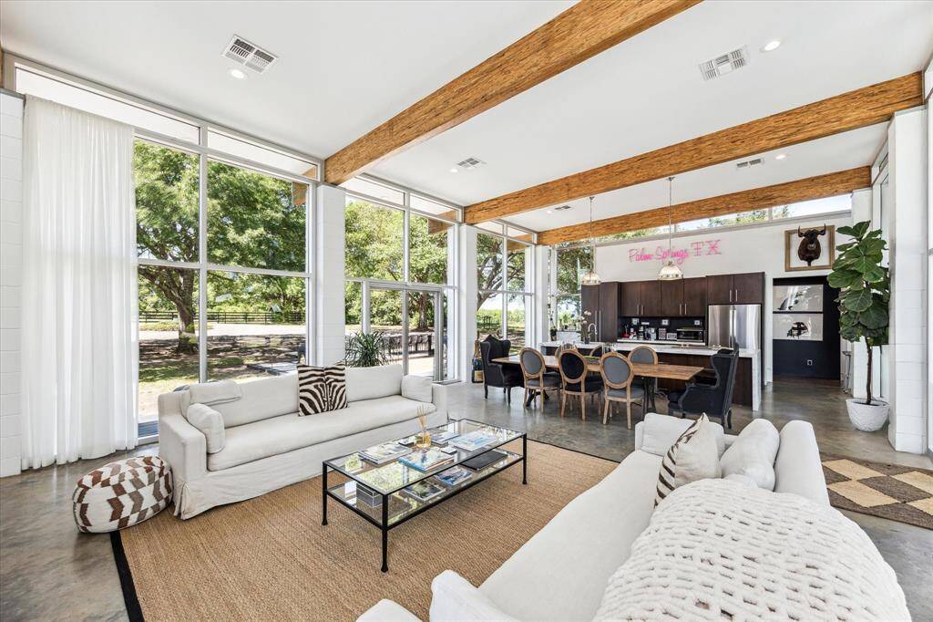 Modern elegance in nature's embrace, welcome to "Palm Springs, TX" as the owners have named this amazing property.