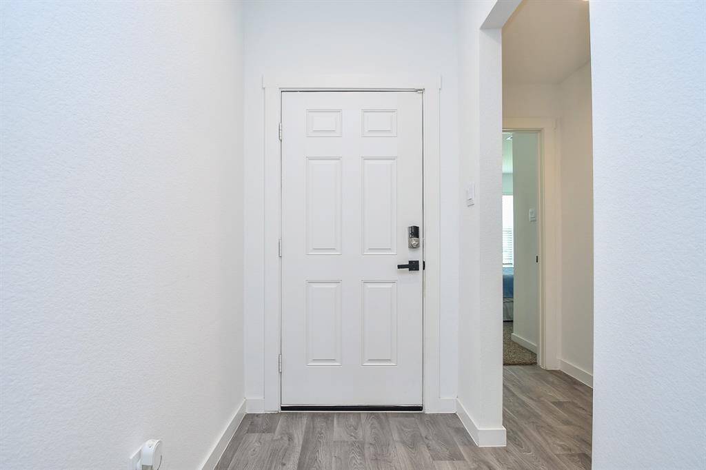 Enter to beautiful flooring carried through all living areas