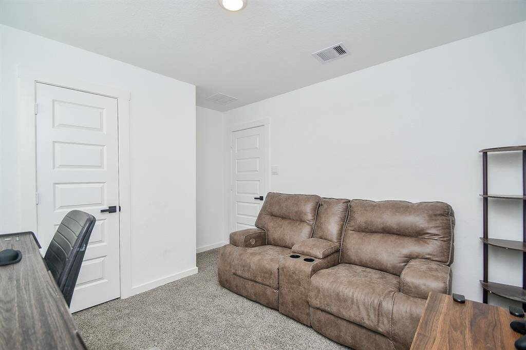 Bedroom number four flexed as a rec room