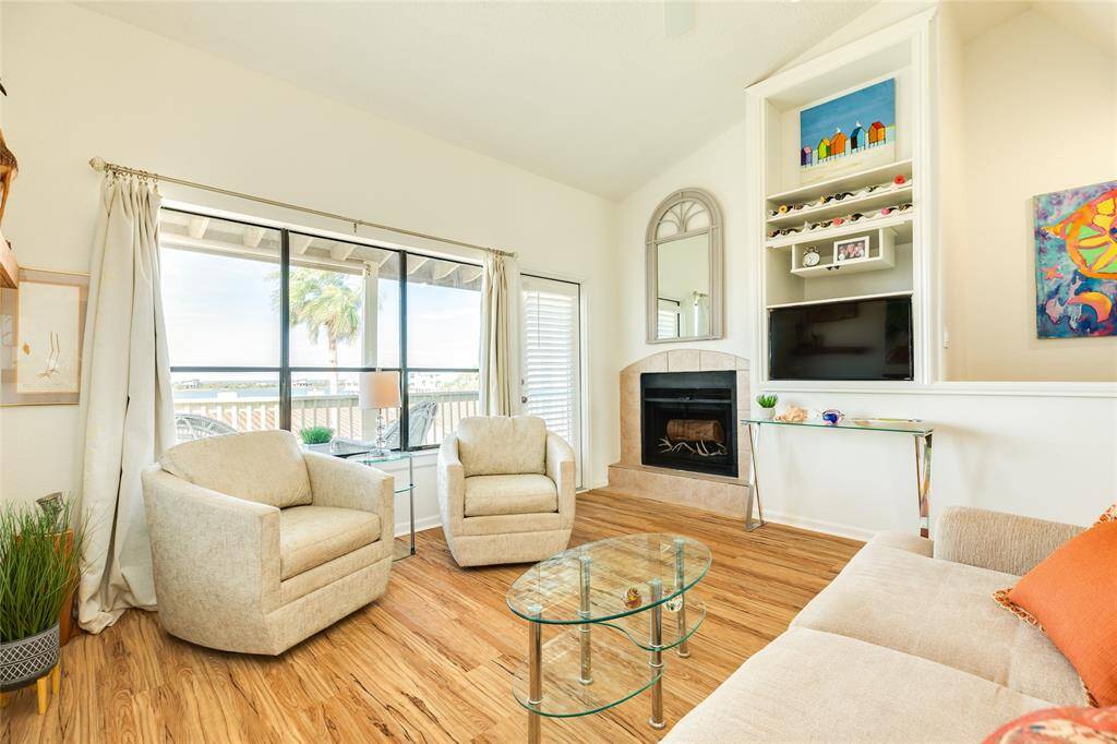 The door in this picture leads to the large deck overlook the water.