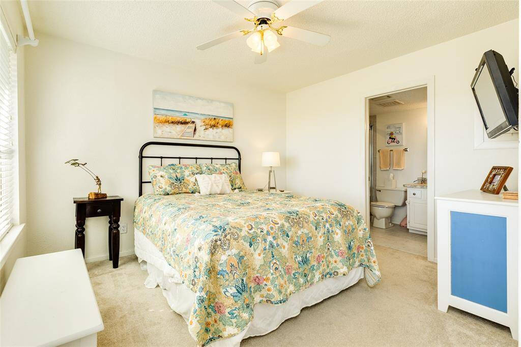 This Primary suite is spacious and bright. Offering high grade carpeting for warmth and comfort, a large sunrise deck overlooking the golf course and wetlands, and an attached full bath.