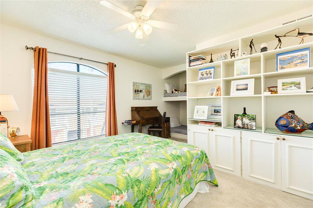 The storage in this large room is great! You'll love having more than enough room for storage and display. Notice the peek of bunks in the background.