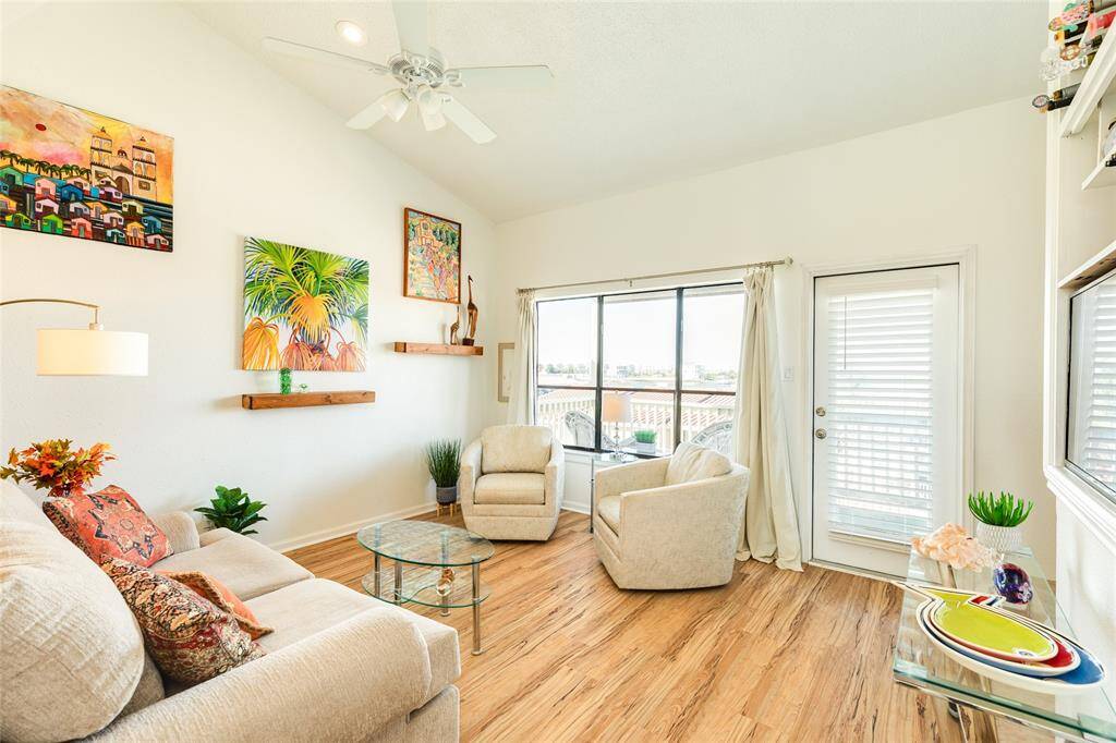 As you enter, you're greeted with open views, high ceilings, loads of natural light and warm, coastal vibes.