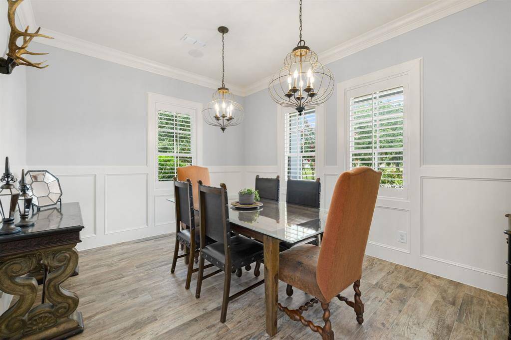 The dining room is perfectly situated to provide a formal space that is also open to the foyer and kitchen for ease of flow when entertaining.