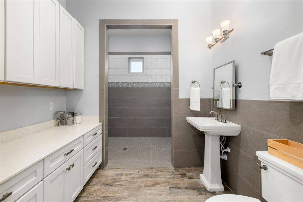 Full bathroom located off the study/6th bedroom is handicap accessible to ADA standards.