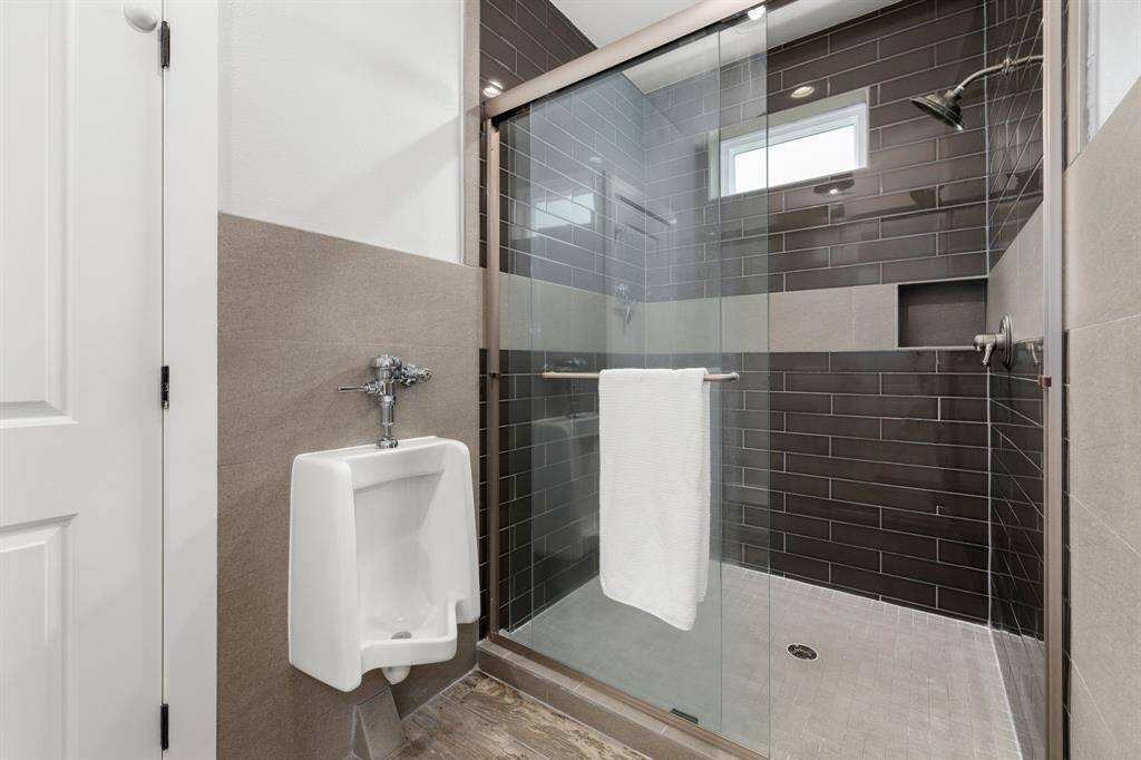 Oversized shower in jack and jill bathroom between the two secondary upstairs bedrooms.