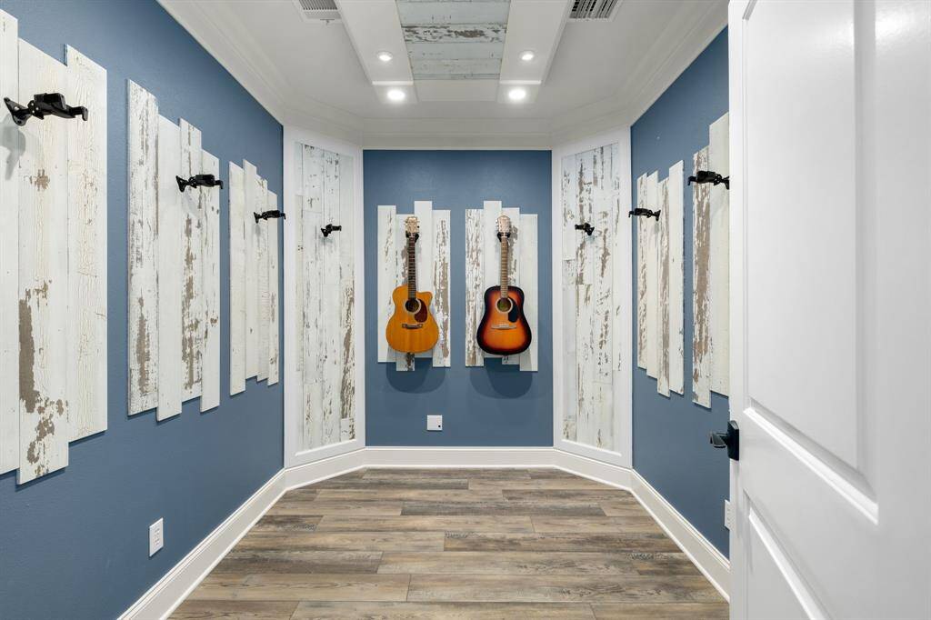 Sound proof studio with guitar hooks or could be utilized as air conditioned storage.