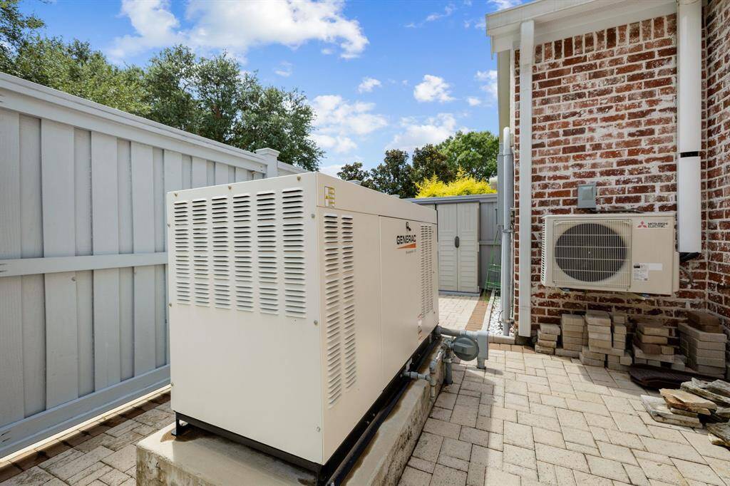 Commercial grade 38 KW liquid cooled Generac whole home generator. Pool equipment and generator are nicely tucked away with a decorative wooden privacy fence and paver decking.