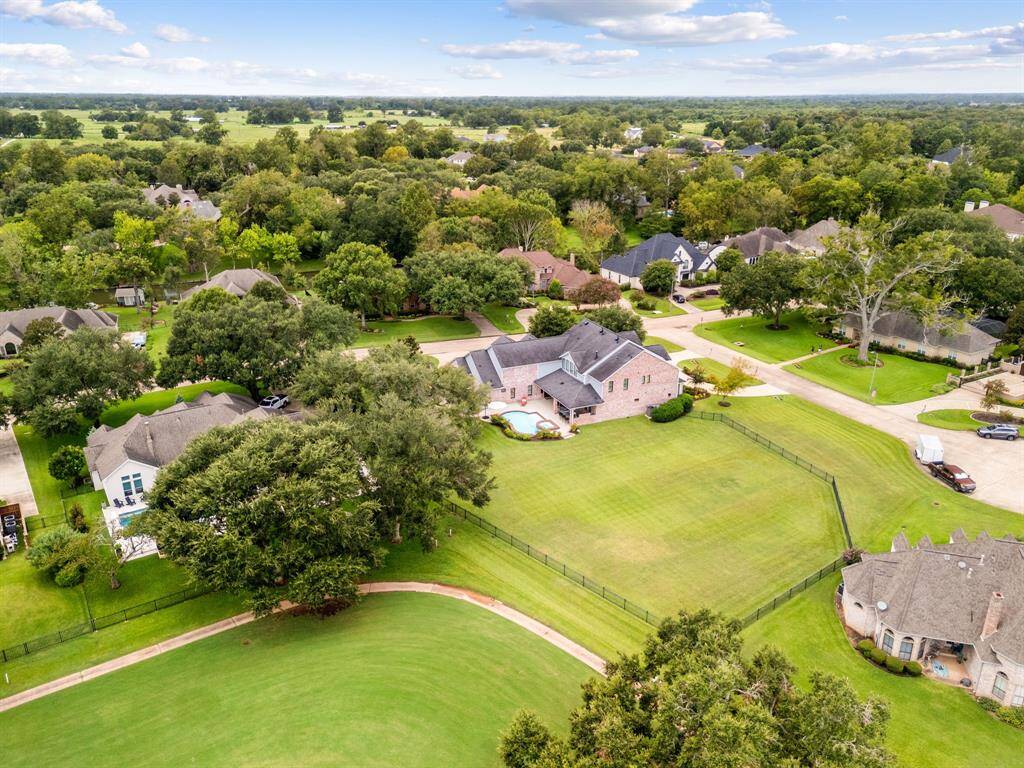 View of the property and cul-de-sac street from the golf course.