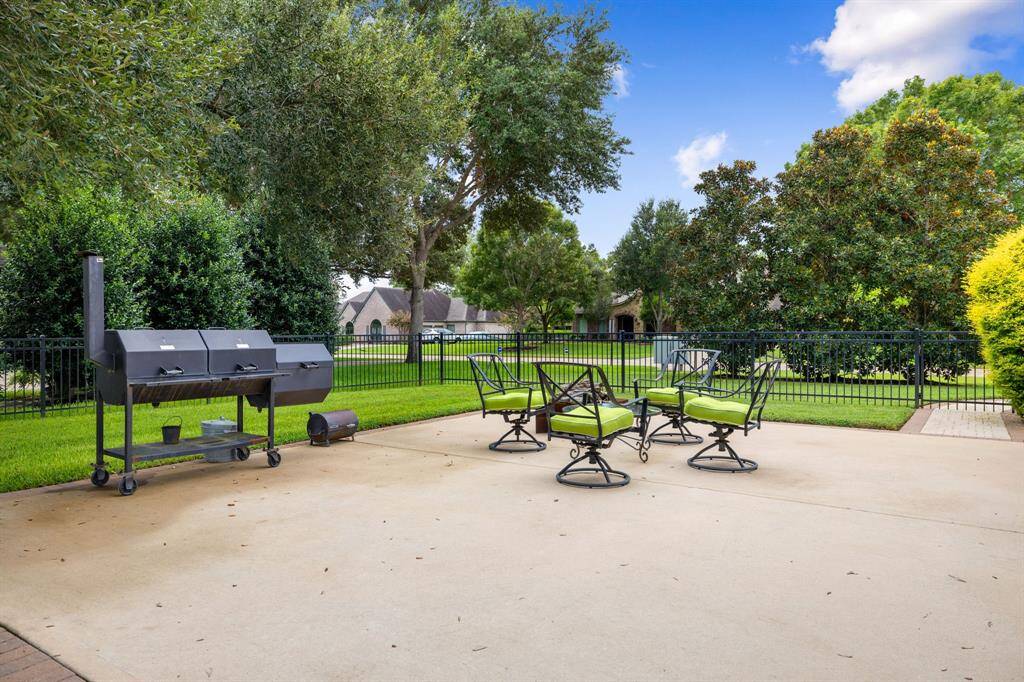 Concrete sport court OR additional seating area for grilling and chilling.