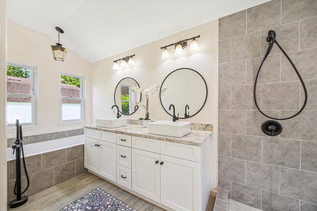 Primary bath with soaking tub and oversized shower! (glass doors coming)
