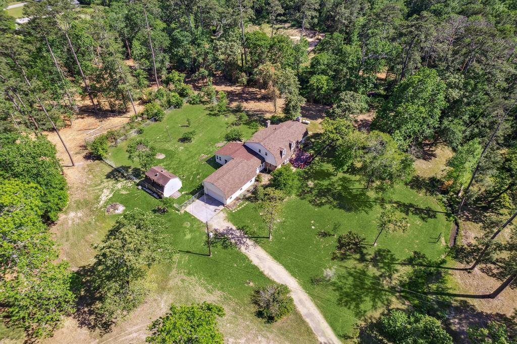 Aerial view of home and property