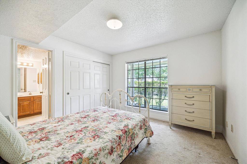 This guest room has direct access to the hall bath.