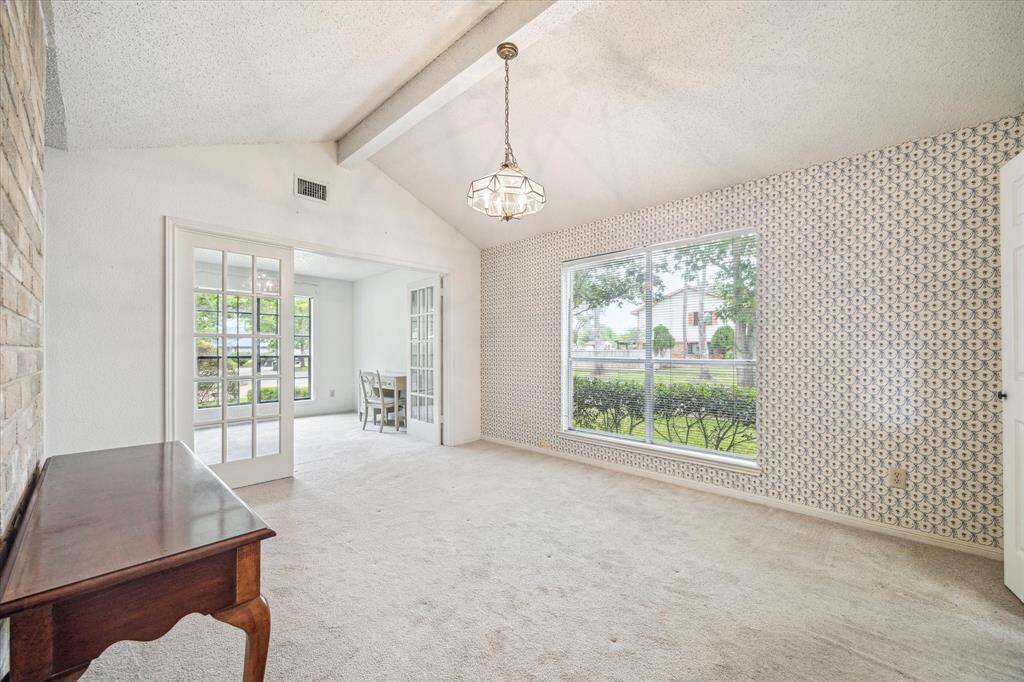 Dining room sits between the study and the kitchen. The natural lighting throughout the home is lovely!