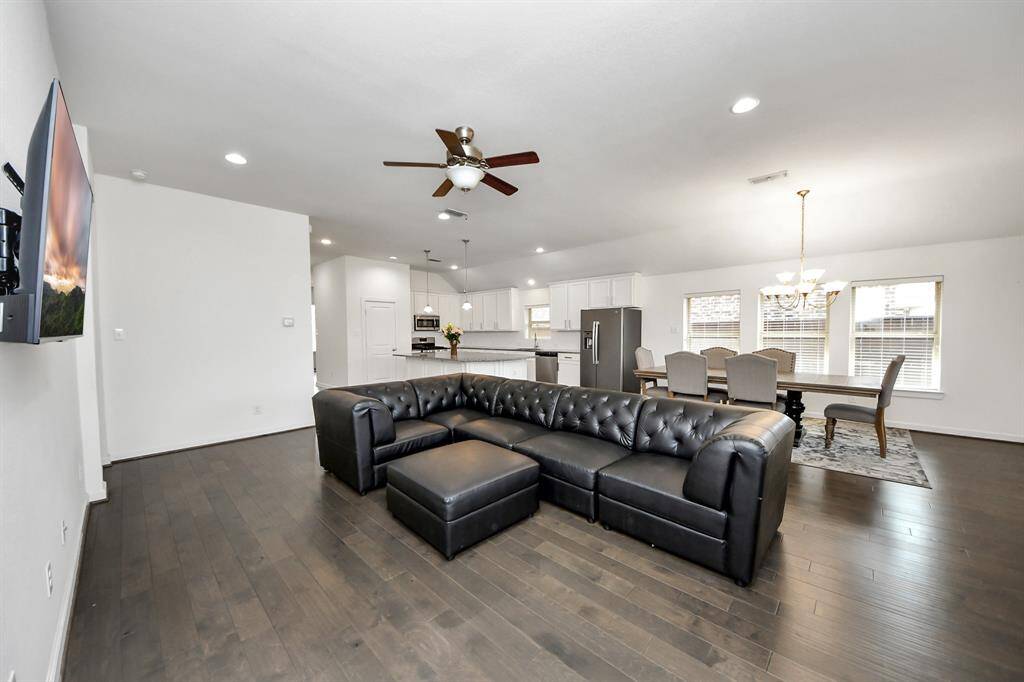 Whether you're preparing meals, hosting friends, or enjoying a quiet evening with family, the open flow encourages connection and makes the home feel bright, airy, and welcoming.