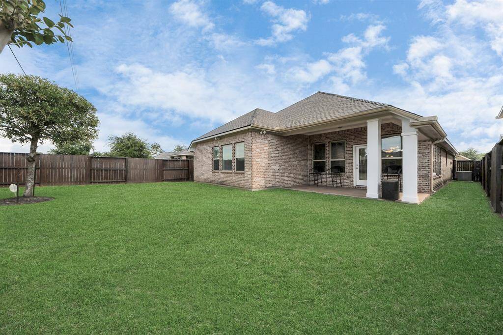 Spacious backyard perfect for entertaining friends.