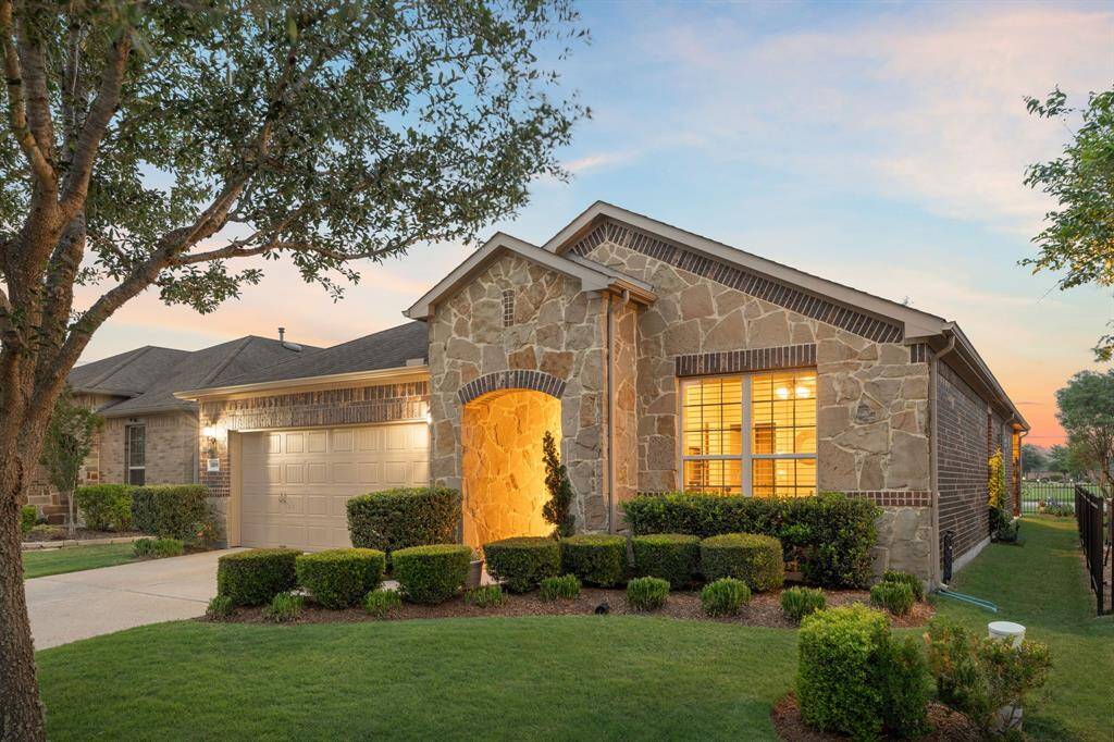 Meticulously maintained landscaping adds curb appeal—this home makes a beautiful first impression.