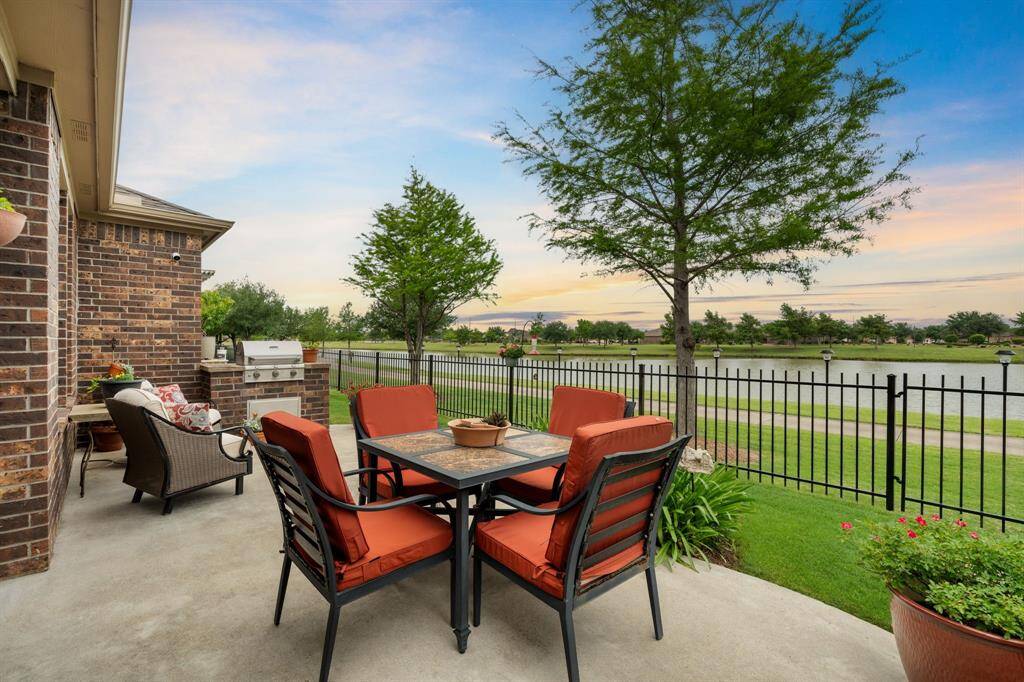 Simply move in and relax, taking in the serene setting. With a gate that opens to a peaceful walk around the lake, it’s the perfect place to unwind and enjoy nature’s beauty.
