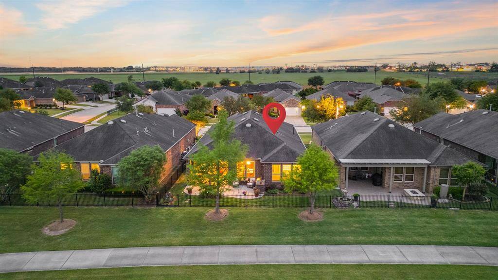 This home offers a tandem garage for extra storage, a water softener for added comfort, and custom plantation shutters throughout. The built-in Murphy bed provides versatile space, and the laundry room features a handy sink. Plus, the dryer offers the option of gas or electric—making life even more convenient.