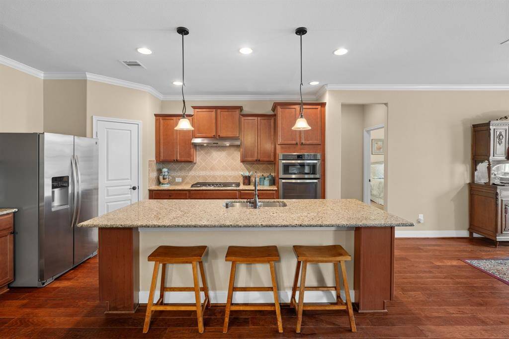 The spacious island is perfect for rolling out cookie dough, baking bread, or gathering with loved ones for casual conversations.