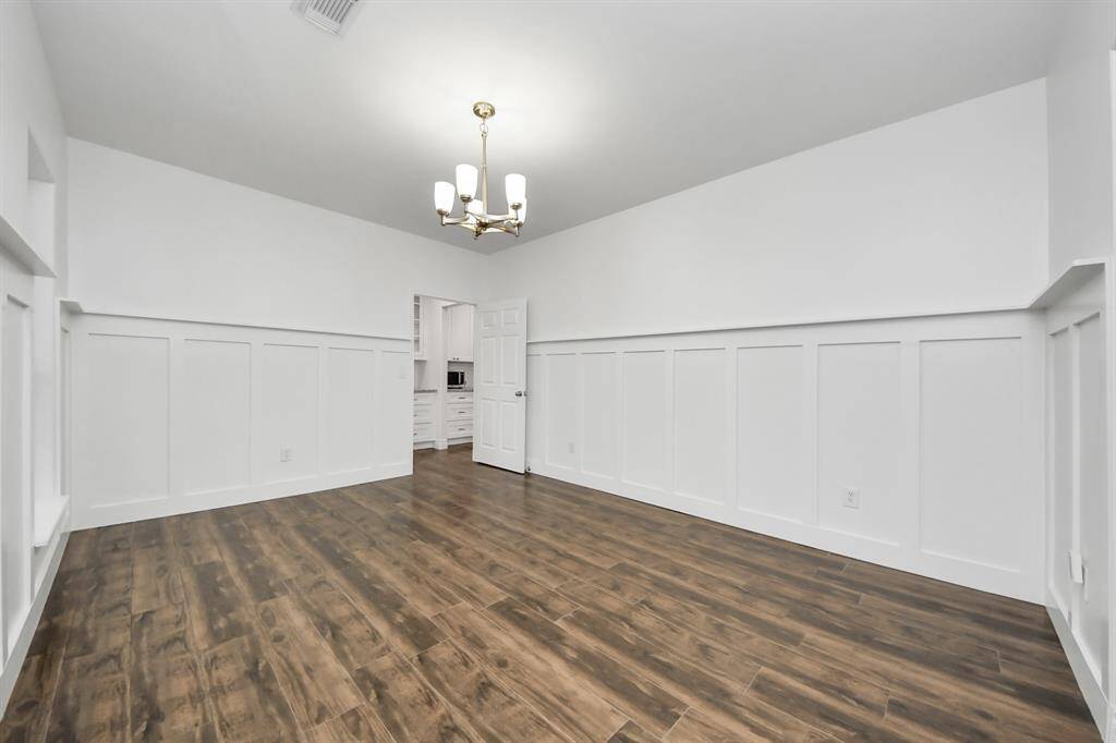 Off of the front entrance, you are greeted with a formal living space which could be an office, additional dining area, play area, and more.