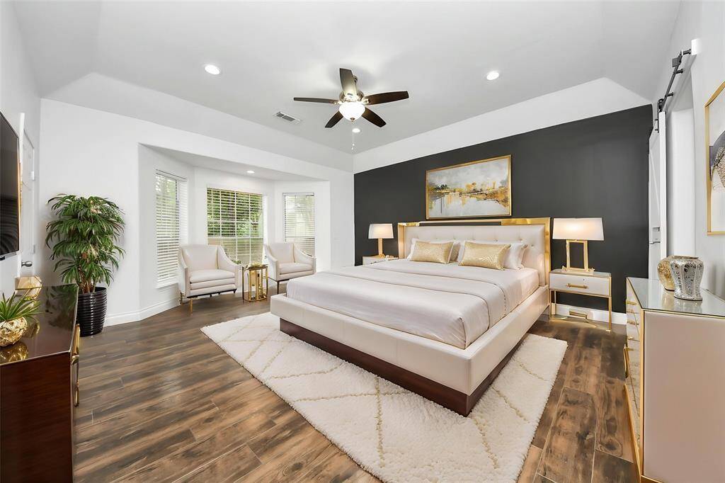 Spacious laundry room with a sink