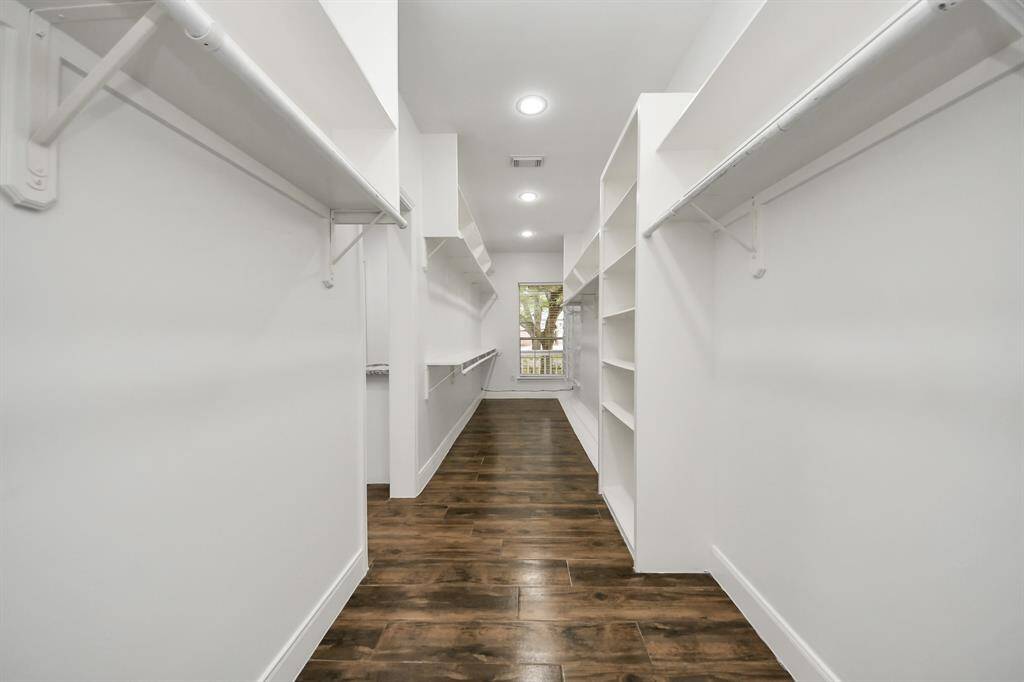 This walk-in closet in the primary is dreamy!