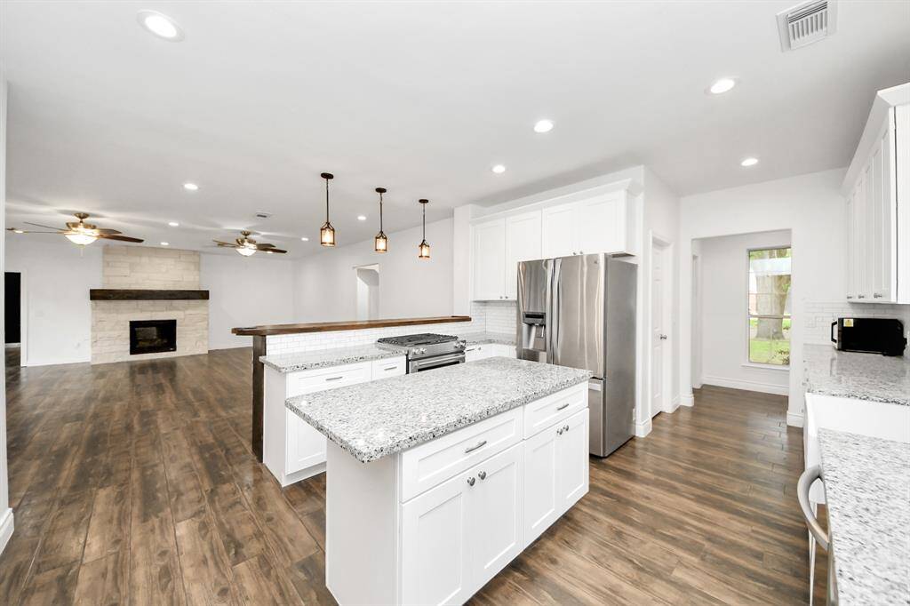 The island is the centerpiece for conversations, staging food for events, or throwing your keys on at the end of a long day.