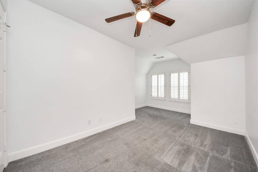 Bedroom 2 is large with lighted closet and lovely natural light