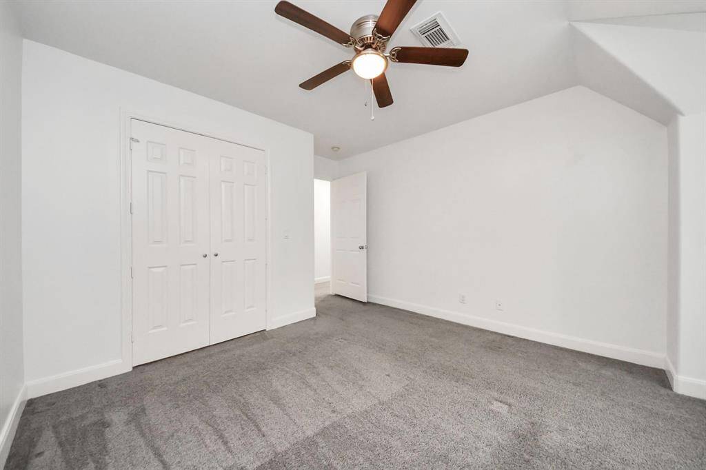 Bedroom 3 is spacious with lighted closet