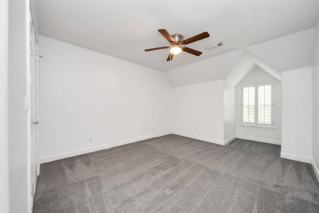 Bedroom 4 is also very spacious with an extra nook for a seat or desk, maybe a reading area.