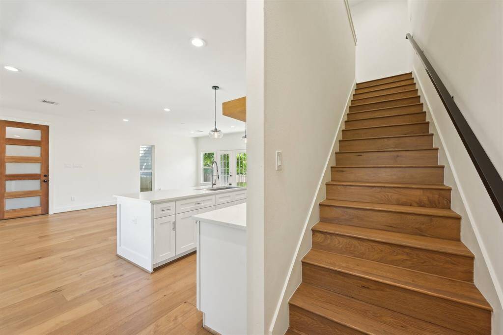 Staircase leading to the upper level.