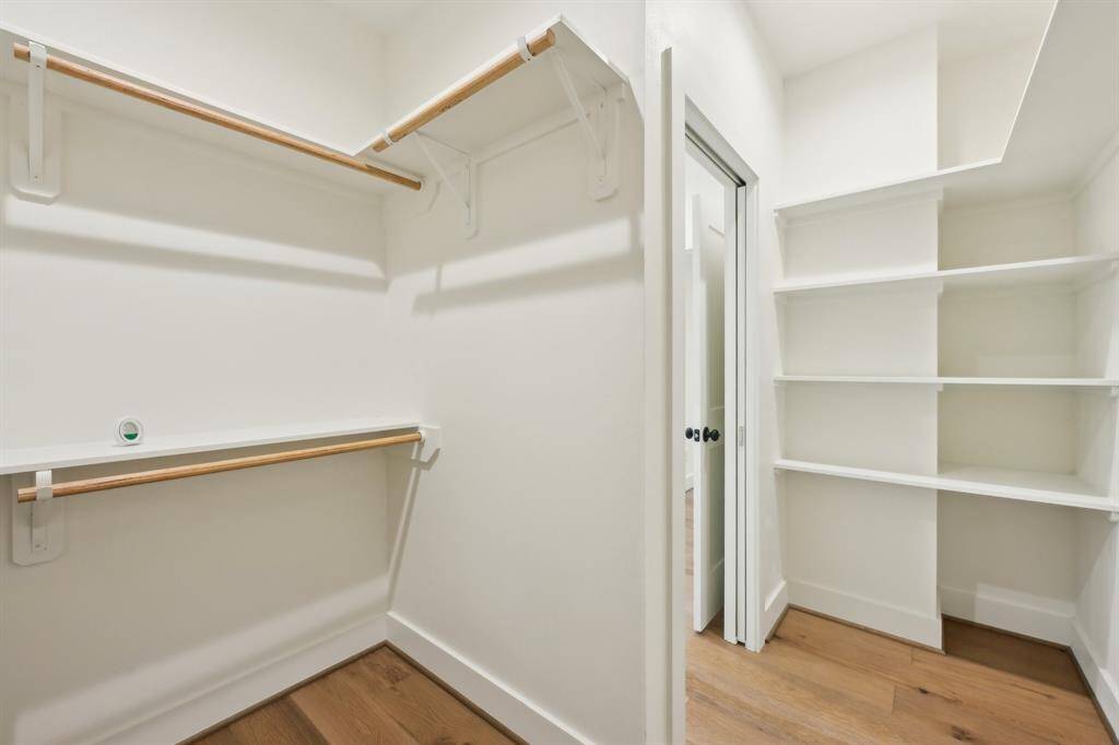 Primary bedroom spacious closet.