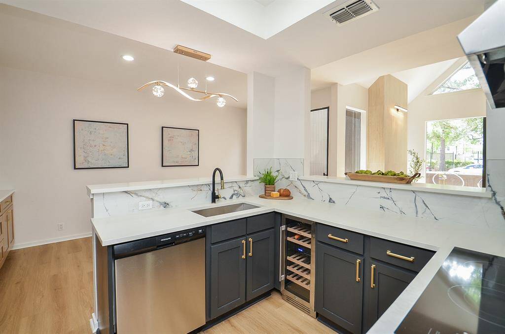 Great Sight Lines from open kitchen with new appliances and Wine Fridge