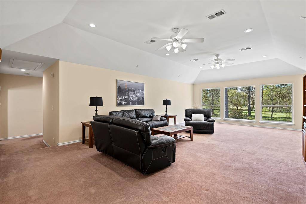 Every room in this home doesn't disappoint with their grand size and did we mention AMAZING views! This is the upstairs game room and has so many possibilities! Yoga studio, pool table, gaming area, craft room, play room, etc.