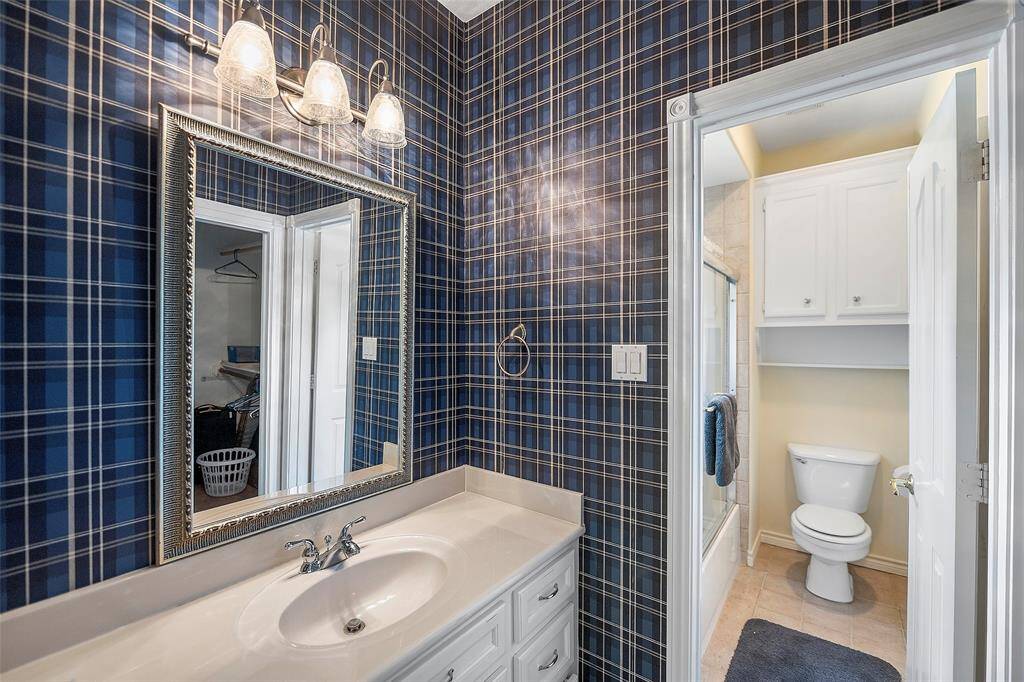 A full sized bathroom with private wet space and plenty of storage too!