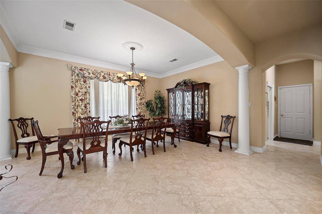 A brilliant dining room awaits you and yours for large family holiday gatherings, or evenings having a fabulous intimate meal at home! Double crown molding and a fantastic chandelier anchor the space!  Freshly painted in 2024, makes this home move in ready!