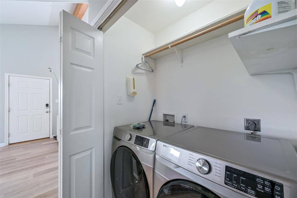 Laundry closet just off kitchen.