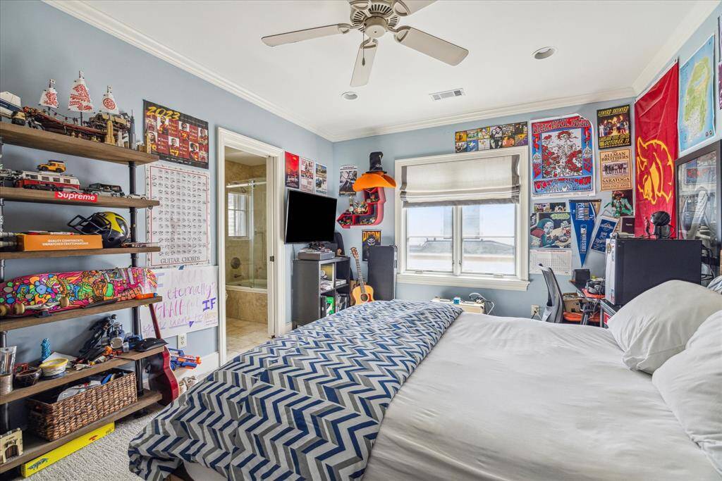 This additional 2nd floor bedroom is thoughtfully designed with plenty of space and natural light streaming in through a large window. The room flows effortlessly into its own ensuite bathroom, offering privacy and convenience for guests. With its serene atmosphere and well-appointed features, this bedroom provides a welcoming retreat.